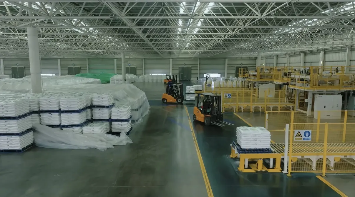 Automatic bagging and palletising line packing 25 kg bags of sodium bicarbonate
