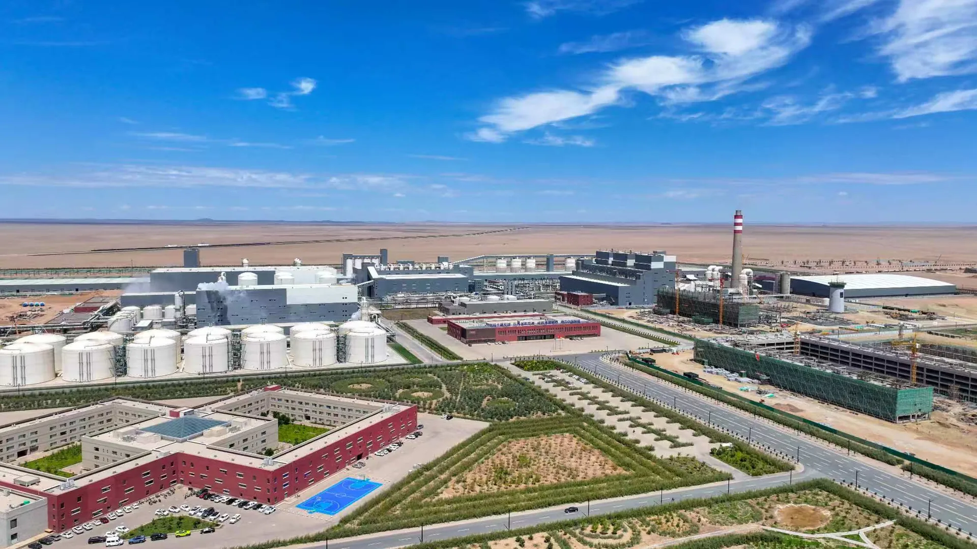 Storage tanks, process buildings and stack at the Alxa Yingen producing plant that supplies the soda ash and sodium bicarbonate we export